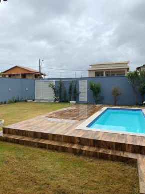Casa Guriri com piscina ao lado da praia excelente localização